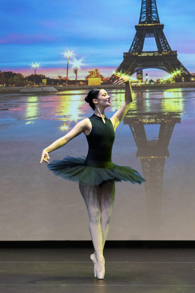 Ballet dancer on pointe in front of Eiffel Tower